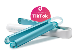 inverse conditioning tongs resting beside a frosted tray